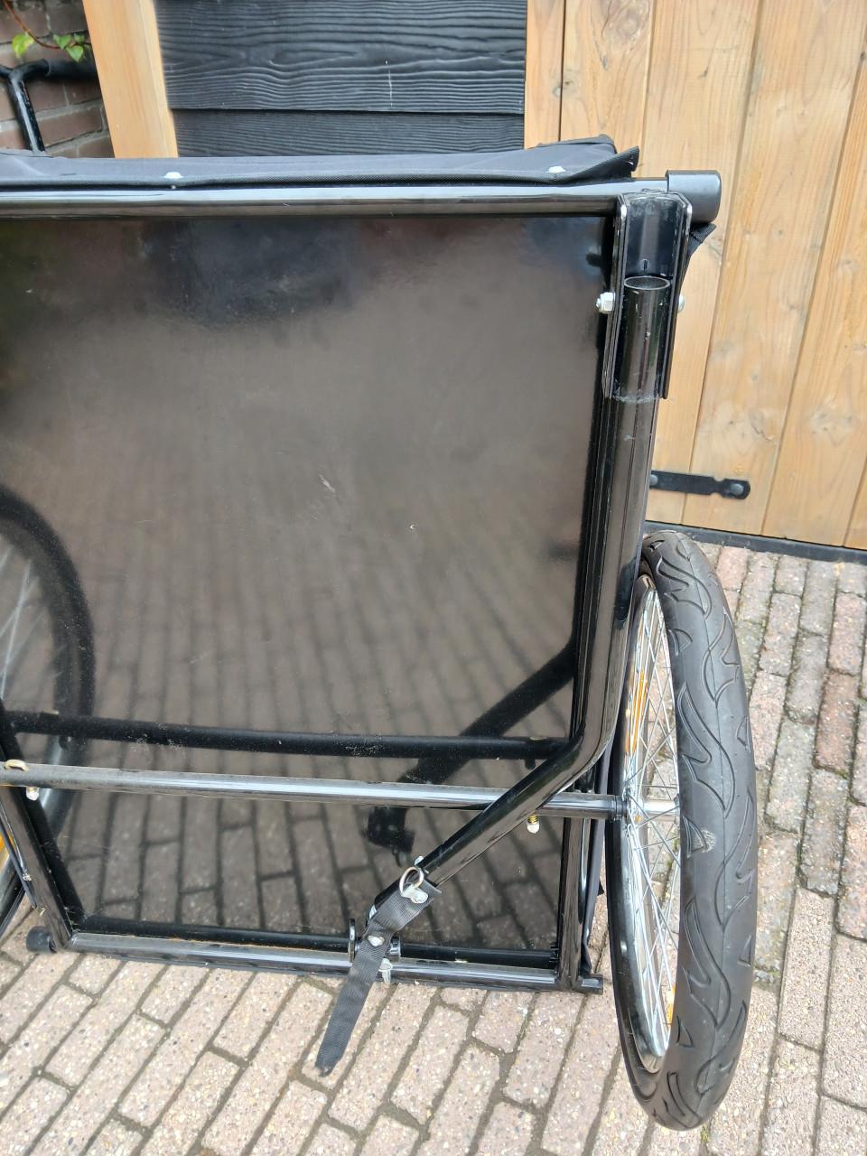 Fietskar met afdekhoes