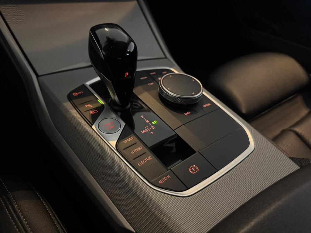 BMW 3-serie touring 320e high executive