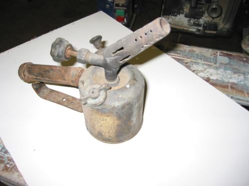 Antieke koperen brander