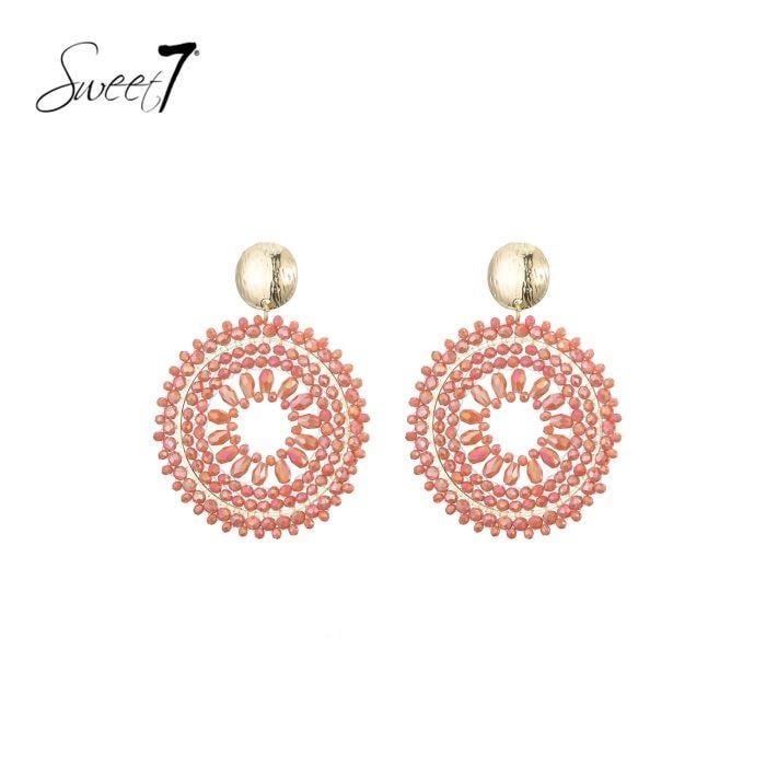 Oorbellen stijlvolle met koraal kleurige kralen