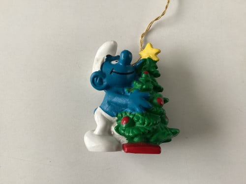 Smurf met een kerstboom.  Kerstsmurf met koord.  Nr. 51901