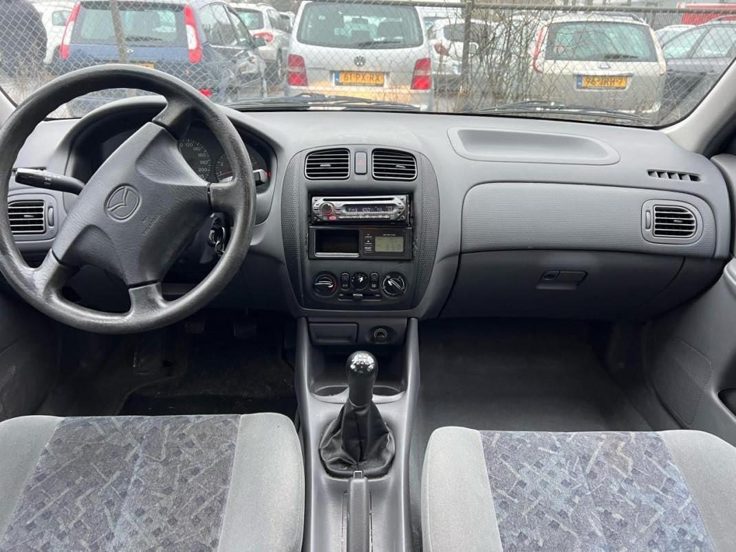 Mazda 323- 1.5 GLX 146.073 KM Airco