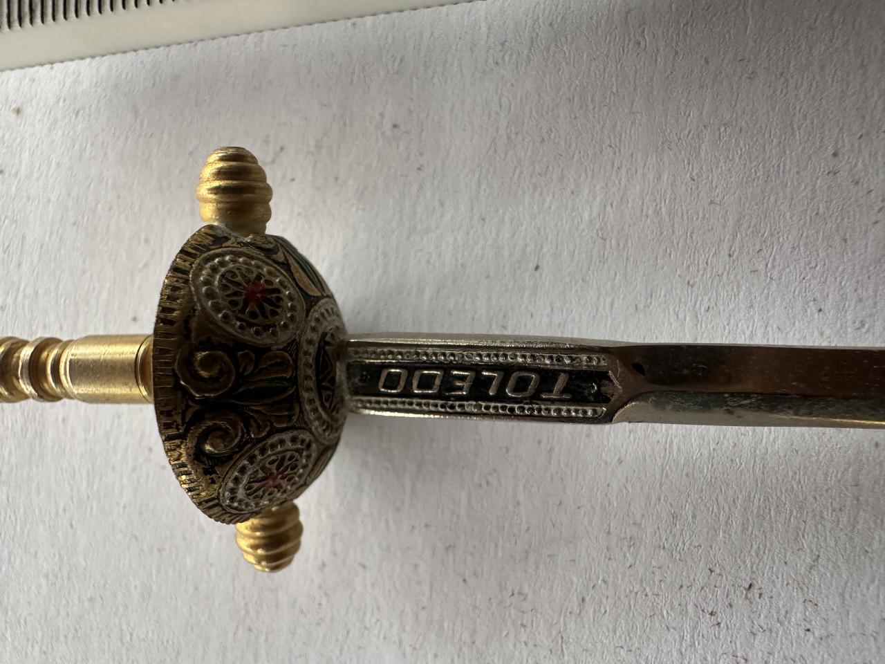 Koperen kaarsendover en brievenopener