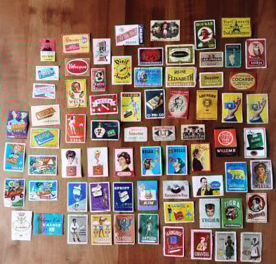 Plaatjes luciferdoosjes o.a. steden,molens, vlaggen, rookwaren, mode e.d.