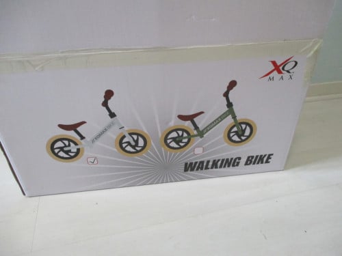 Te koop nieuw in doos 12"loopfiets (te klein gekocht)