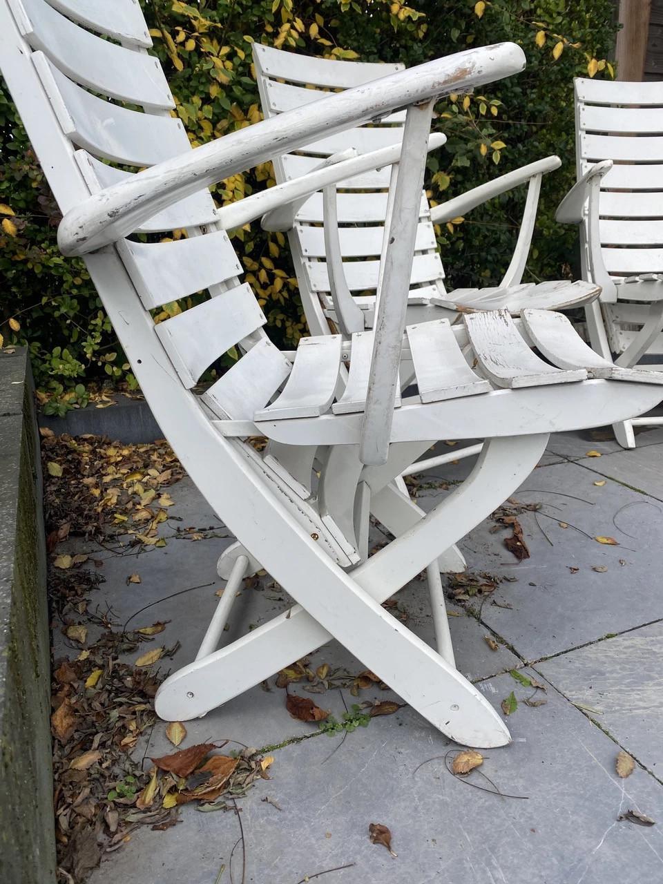 4 houten folding chairs 5 standen