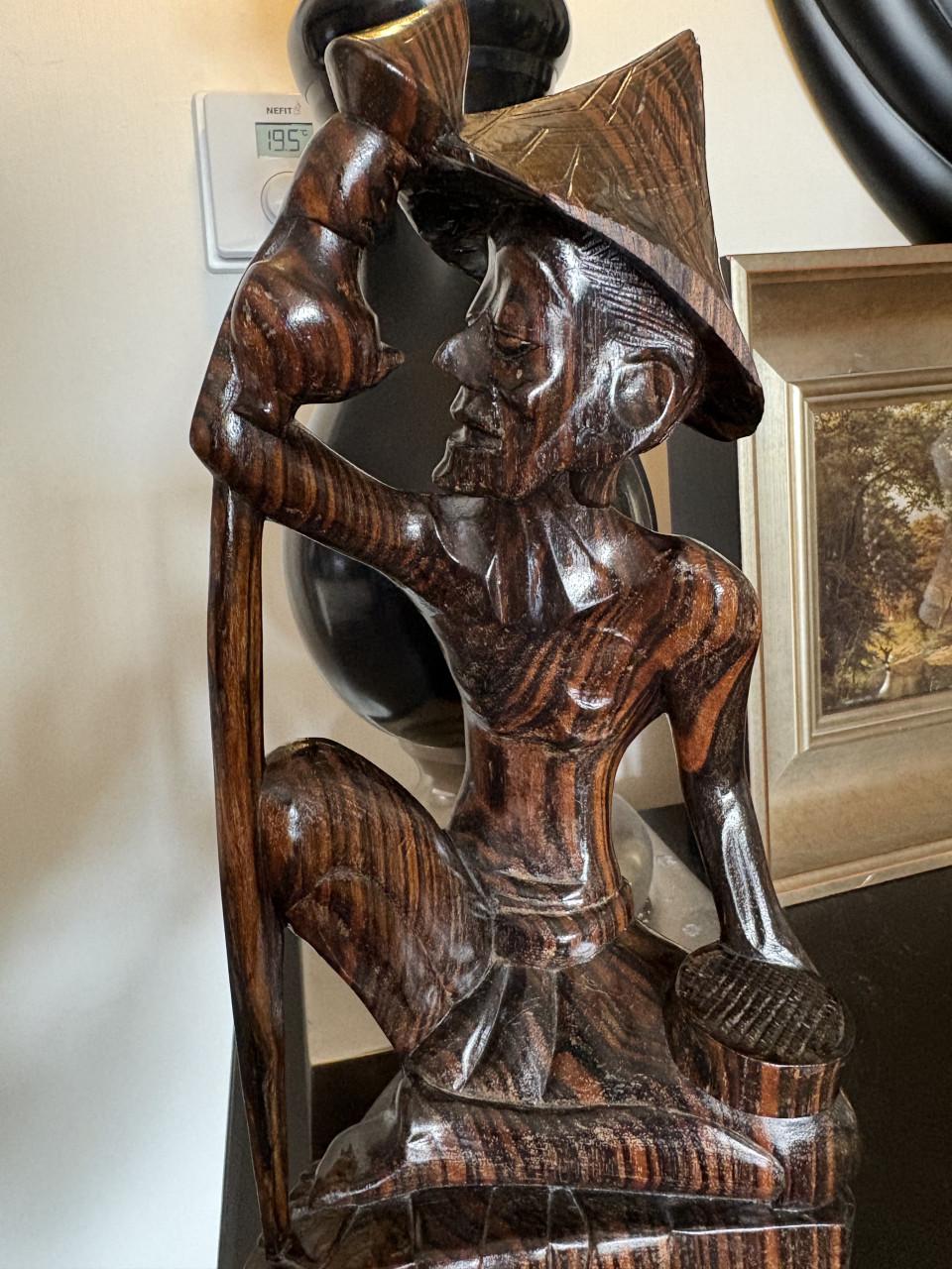 Houten beeldje uit Bali , Indonesie