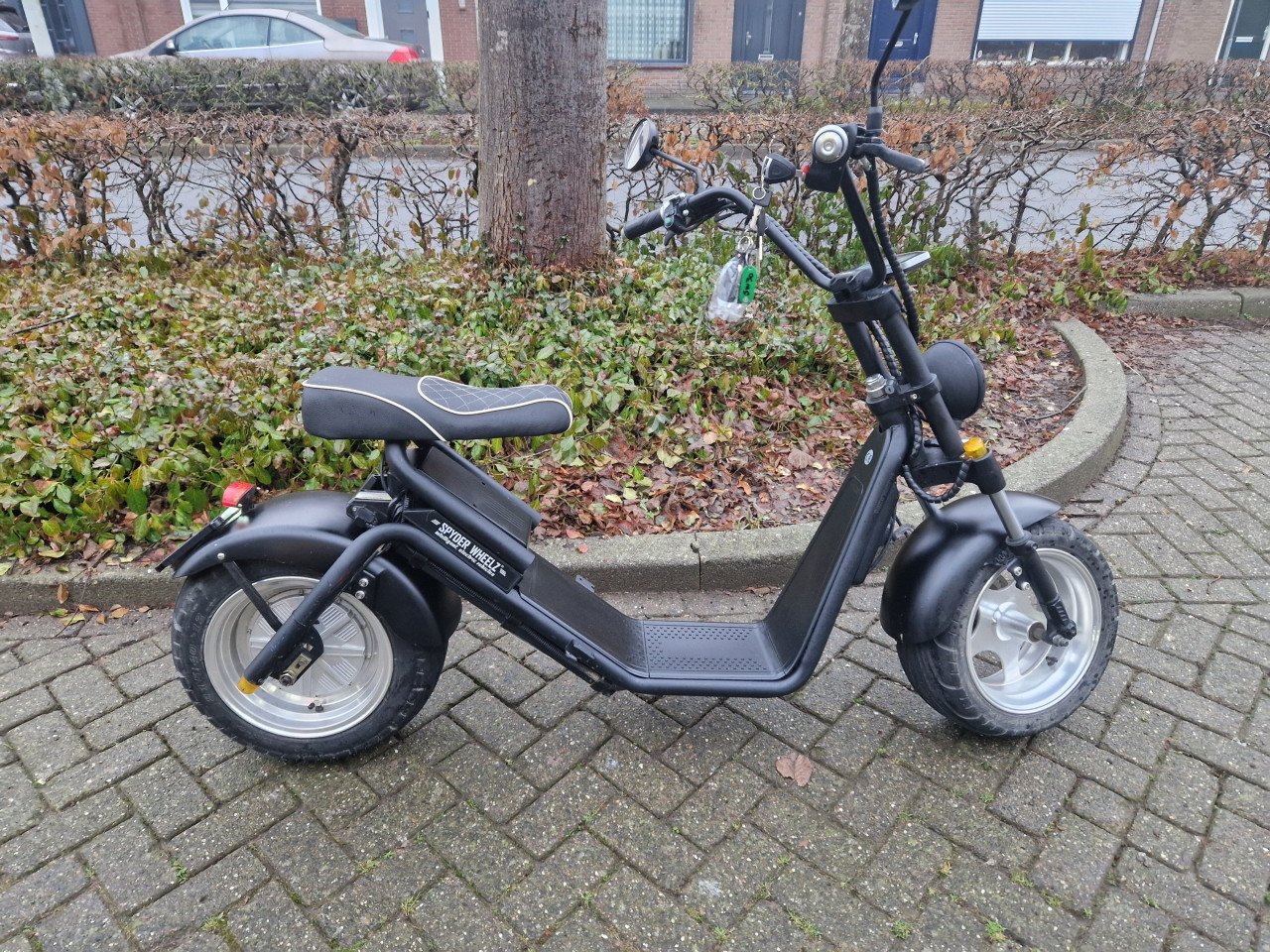 Super gave Spyder Wheelz E-chopper