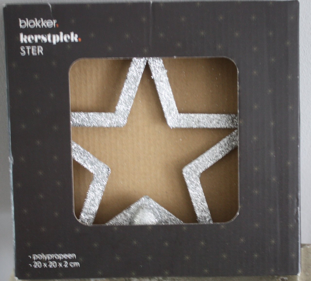 Nieuw in verpakking zilverkleurige glitter piek ster