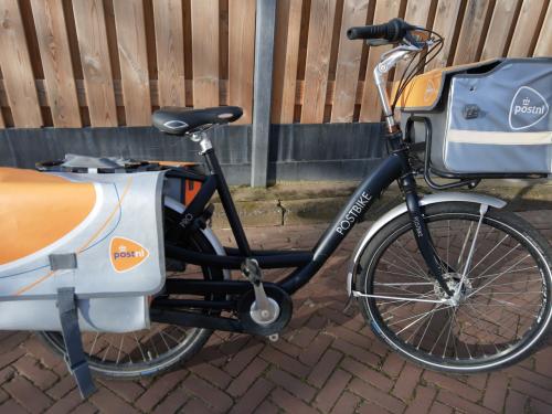 Postbike fiets (zonder de tassen)        50 euro