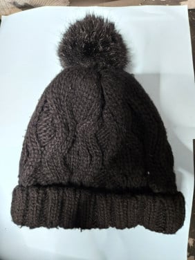 Zwarte wollen muts met pompon H&M 30% wol