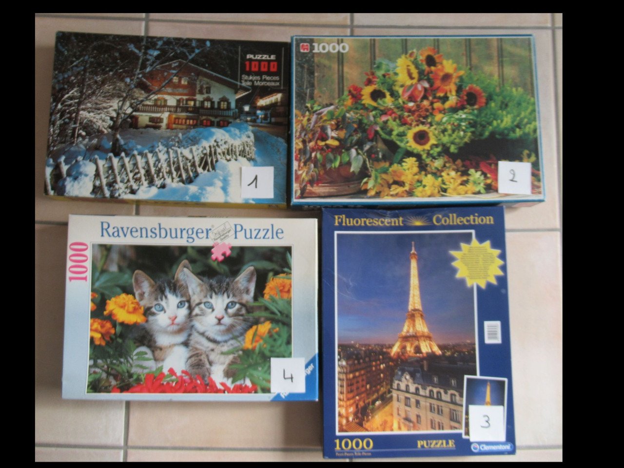4 leuke volledige puzzels van 1000 stukjes.