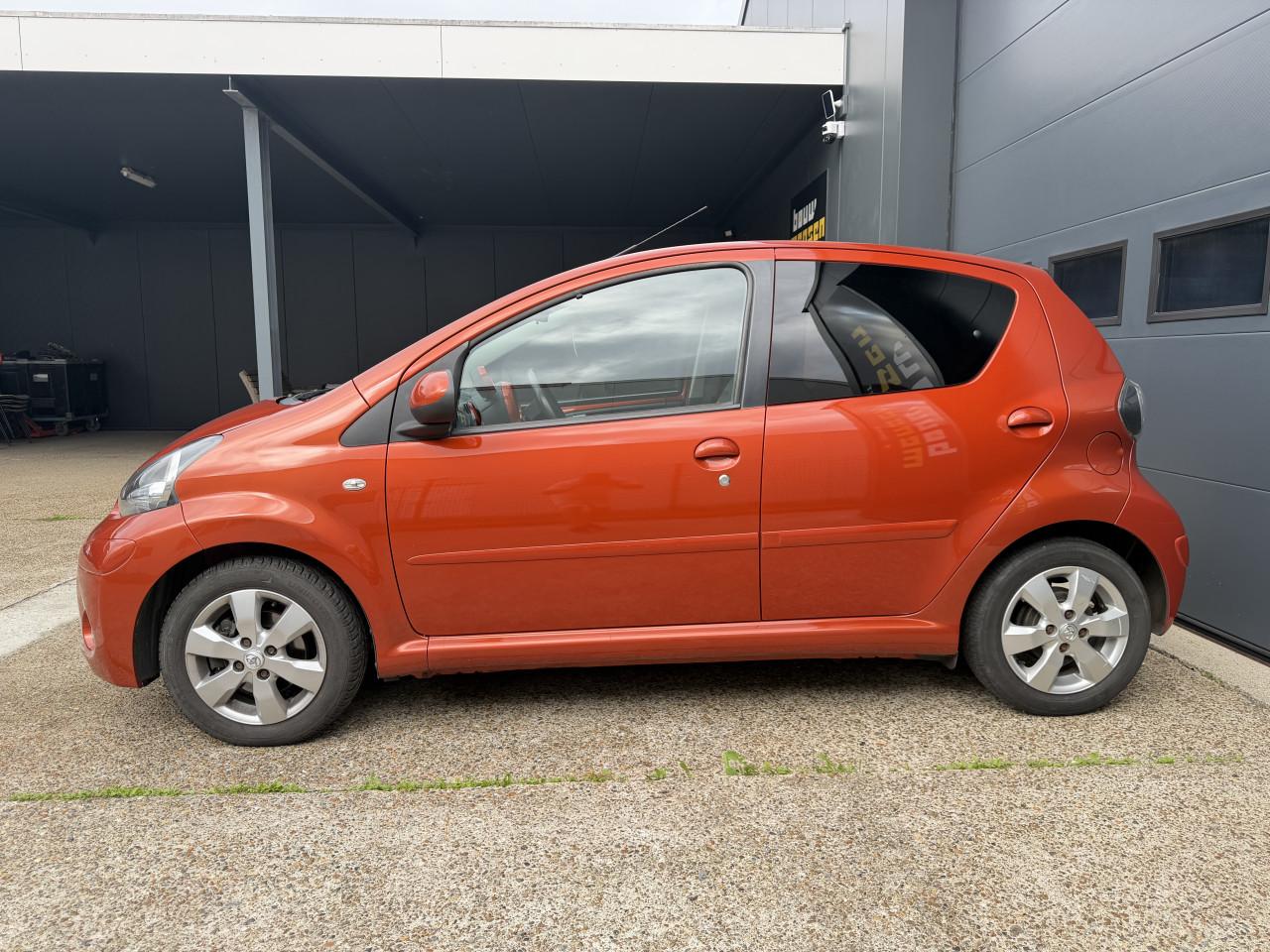 Toyota Aygo 1.0 12V Vvt-i 5DRS 2012 Dynamic Orange Airco Apk