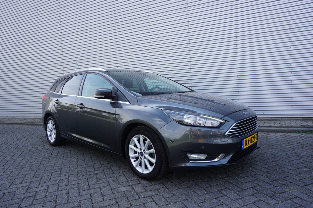 Ford Focus wagon 1.0 titanium climate / navi / stoelverw. / cruise / trekha