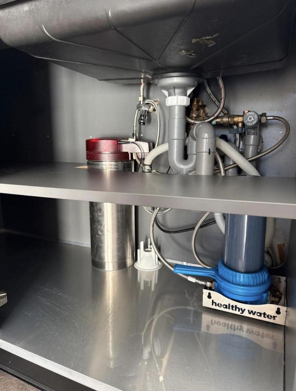 Complete hoekkeuken met Quooker, Siemens en Atag apparatuur