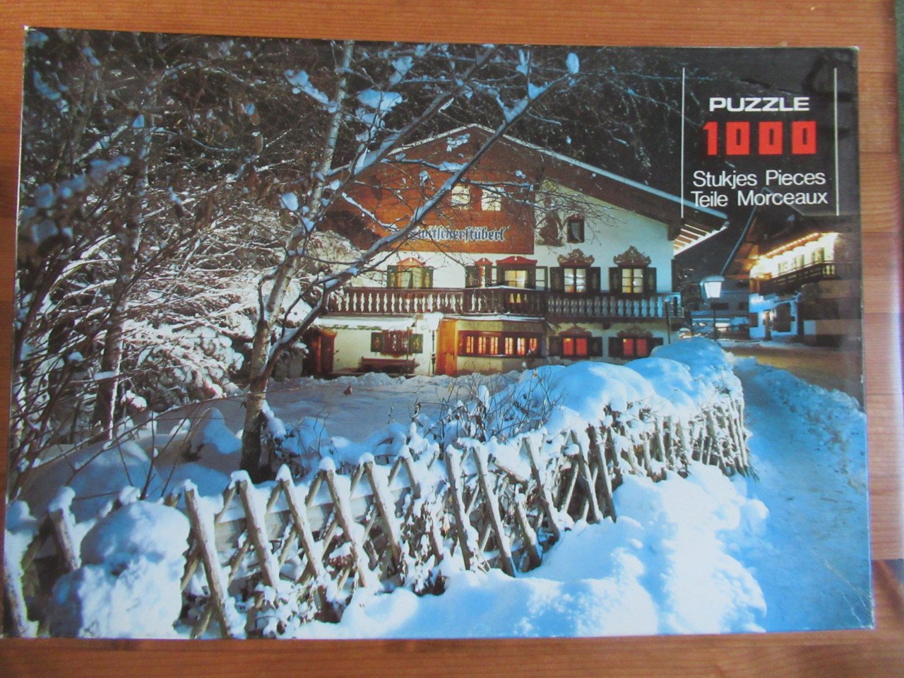 4 leuke volledige puzzels van 1000 stukjes.