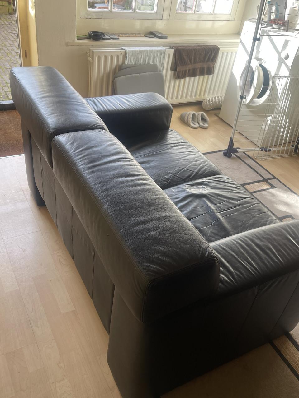 Tweedehands zwarte leren bankstel te koop aangeboden