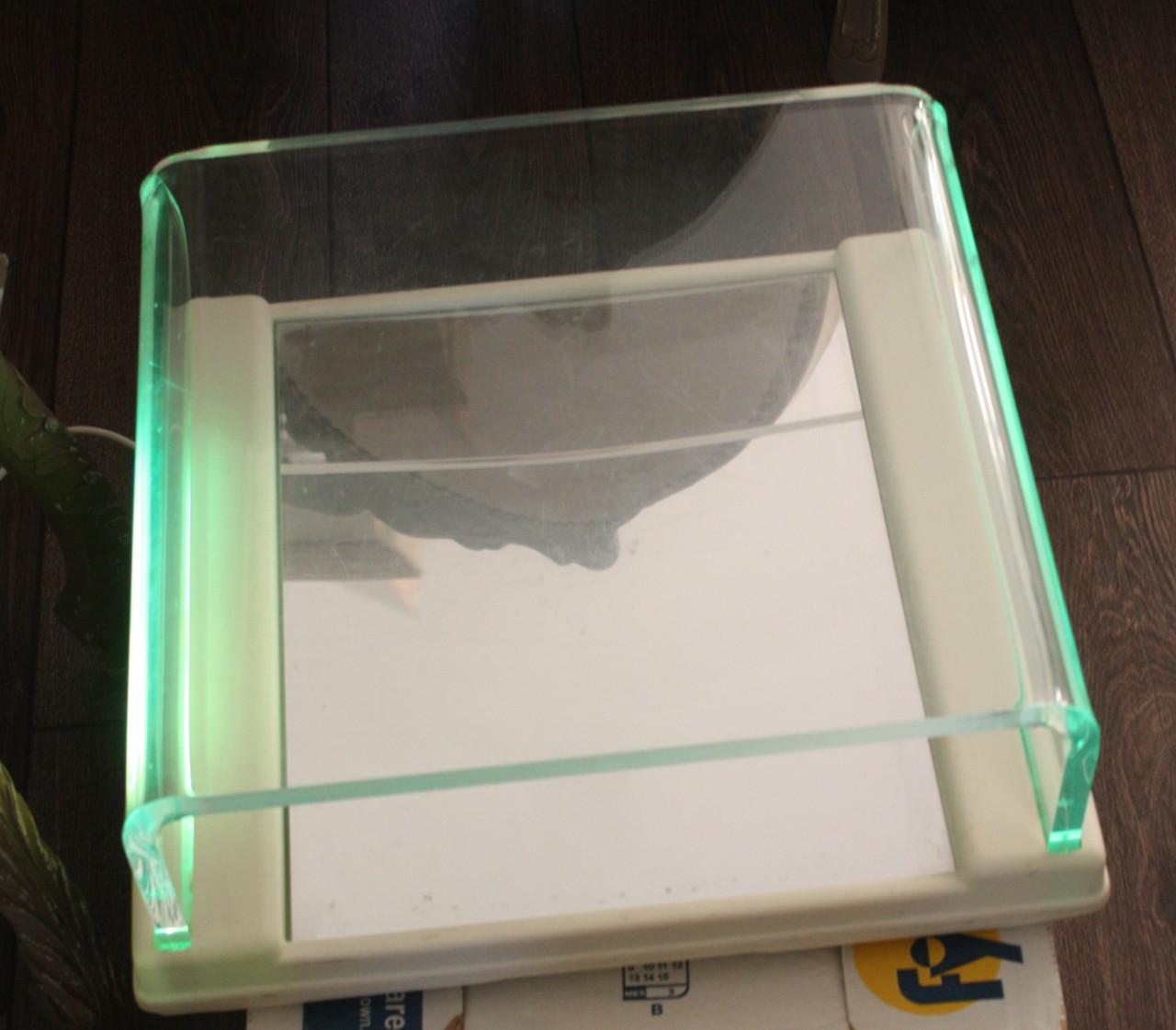 Methacrylaat podoscoop met groen licht.