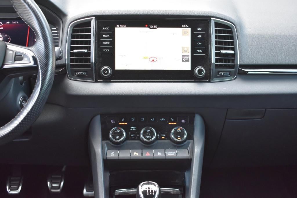Skoda Karoq 1.5 tsi act sportline | trekhaak | canton | adaptieve cruise co