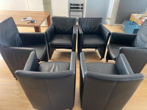 6 lederen eetkamerstoelen