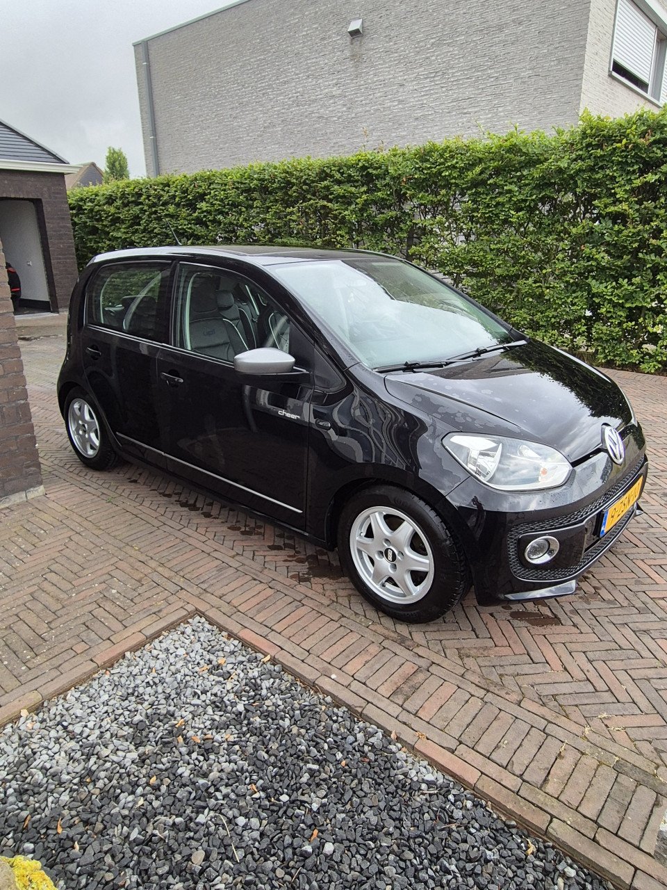 VW High Up BlueMotion 75 pk lederen stoelen