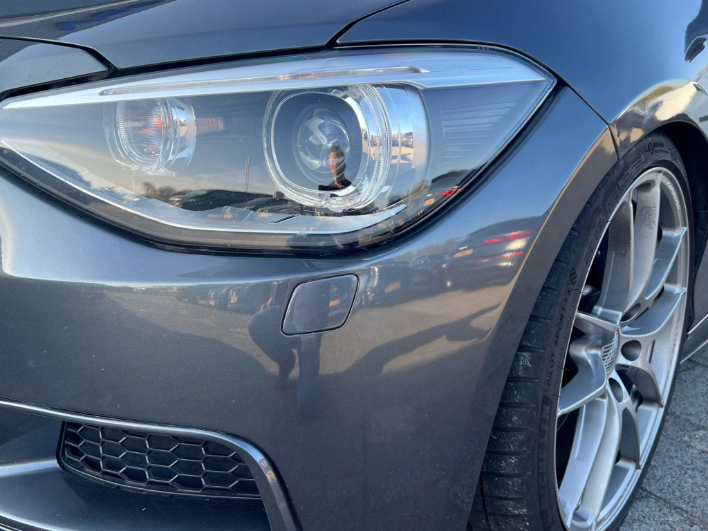BMW 1 Serie m135i xdrive high executive, customized, stage 2 437 pk!
