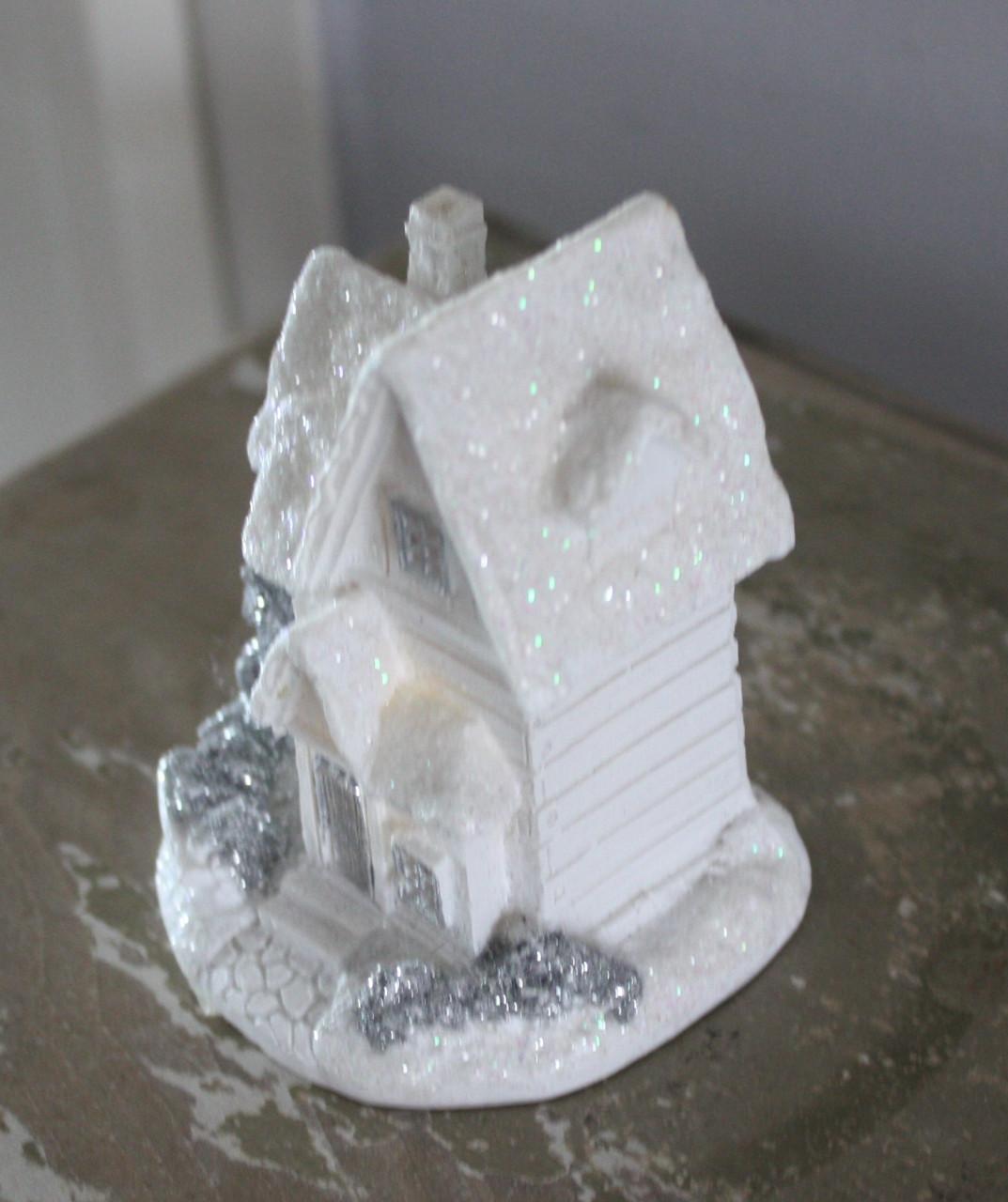 Wit kersthuisje et licht