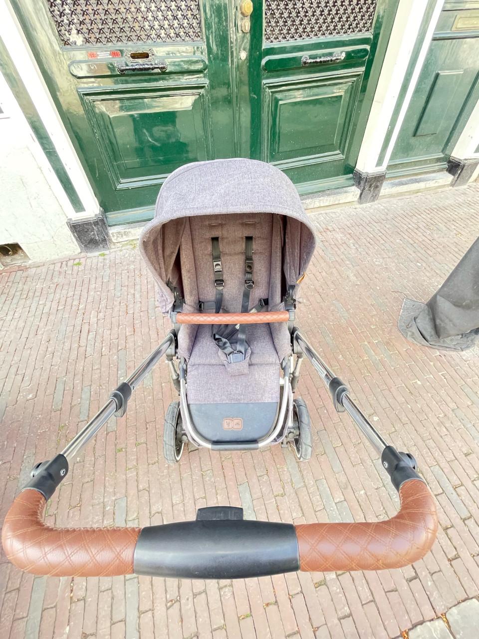 LUXE KINDERWAGEN MET VERING EN LUCHTBANDEN EN 50+ SUNPROTECTION