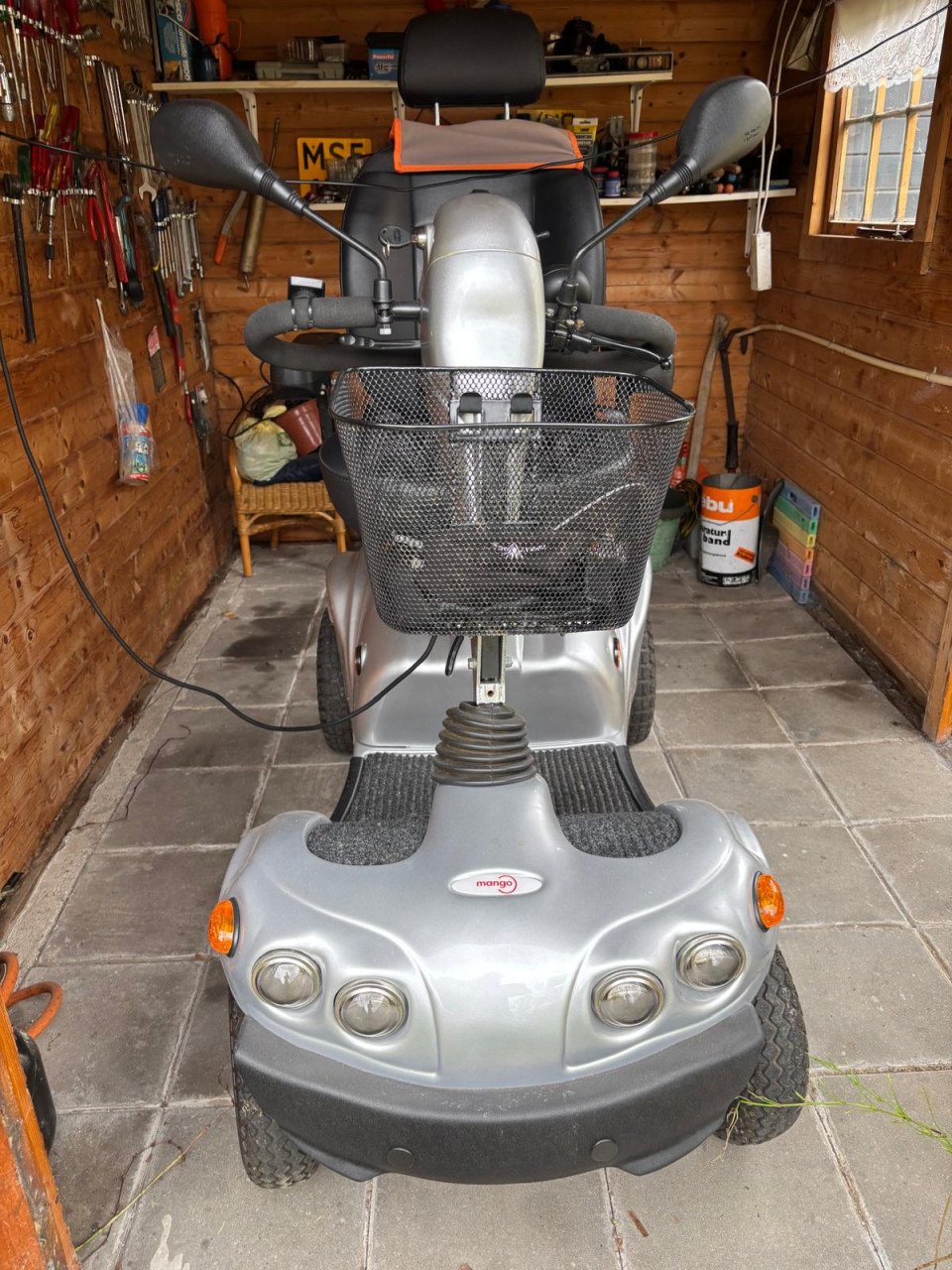 Mooie mango scootmobiel met groot bereik!