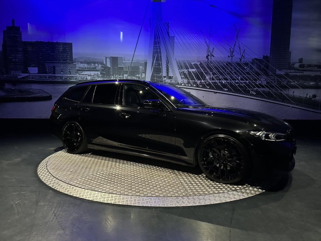 BMW 3-serie touring 330e xdrive *pano*360camera*sportstoelen*laser*eibach*