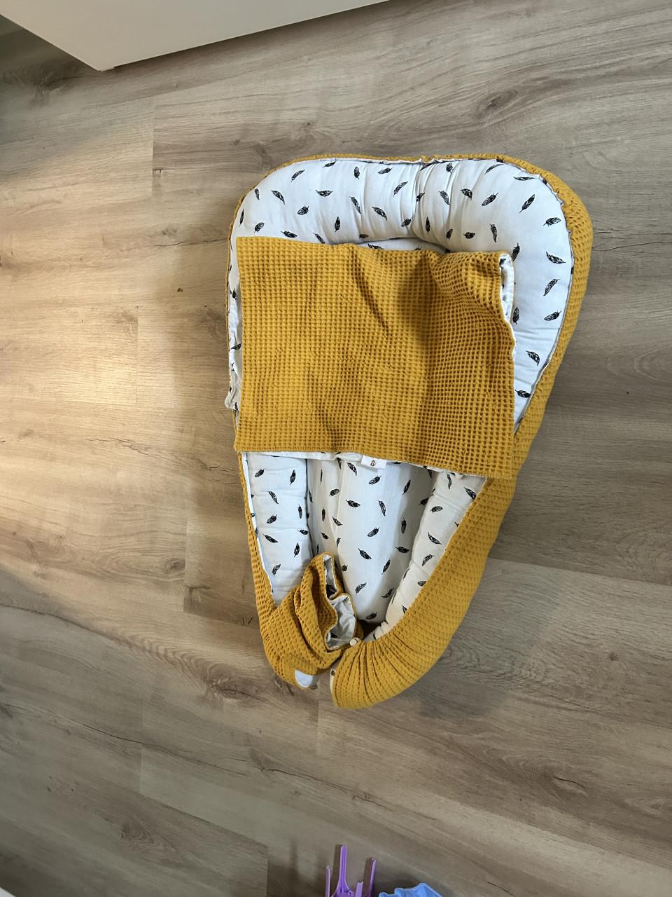 Baby nestje trainings kleed kleine ledikant