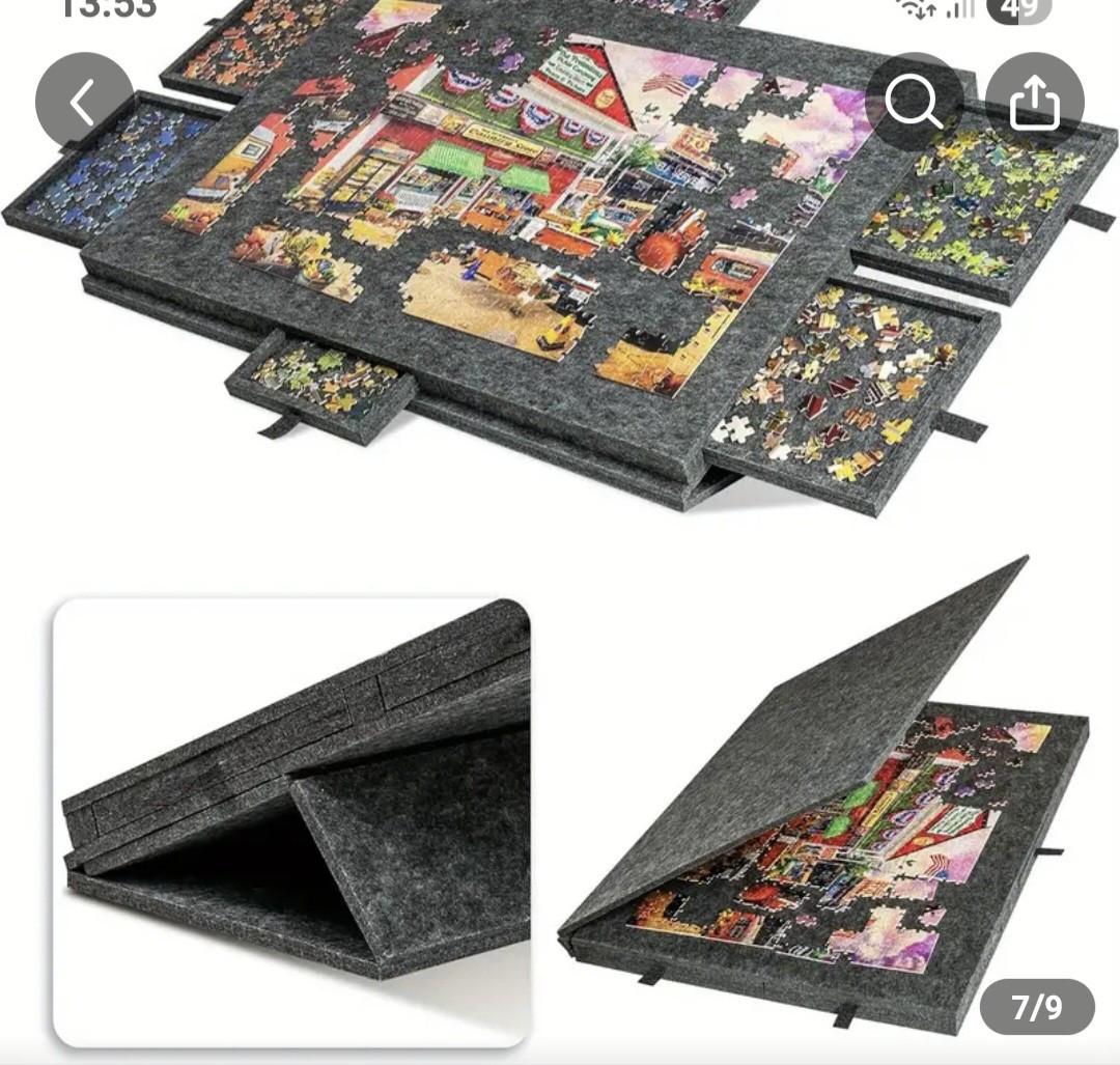 Een draagbare vilten tafelblad voor 1000-delige puzzels met lades