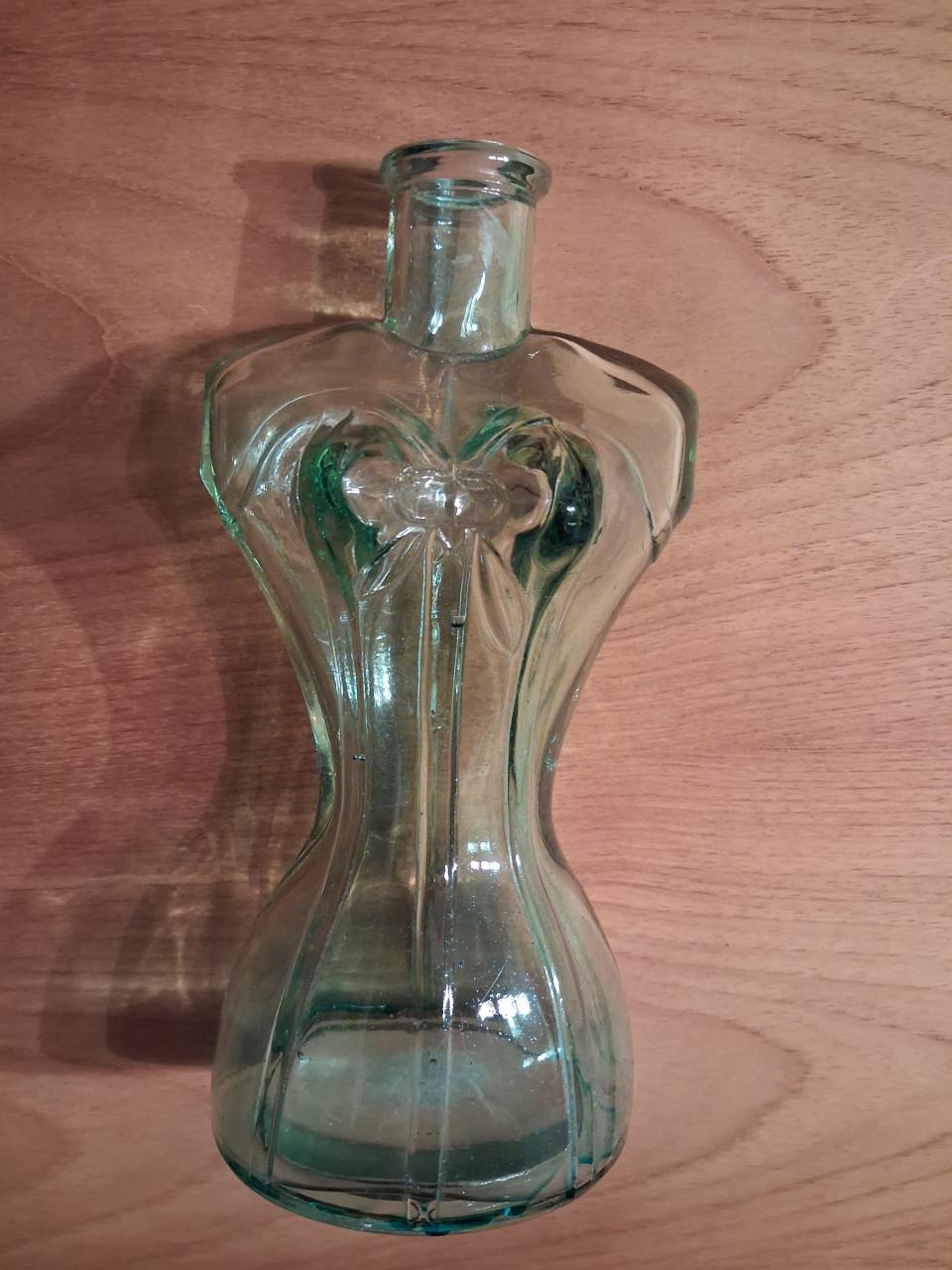 Vaas of fles in de vorm van een buste