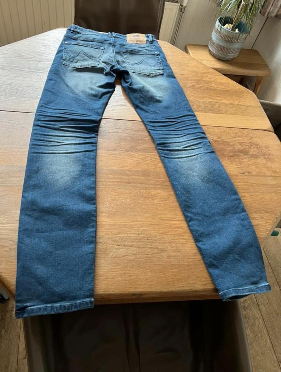 Te koop: Petrol jeans (nieuw)