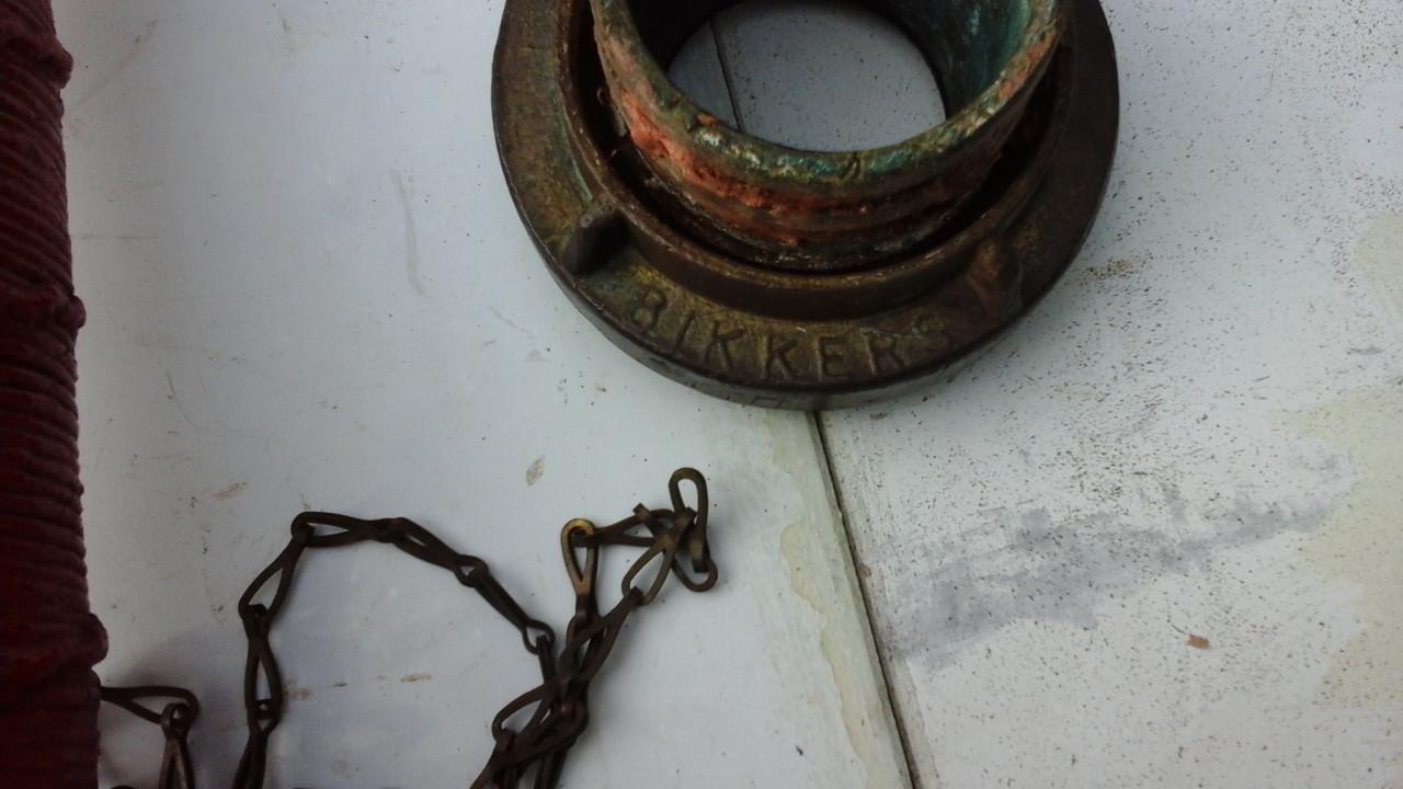 Koperen brandweerspuit