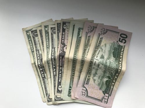 155 USD in biljetten