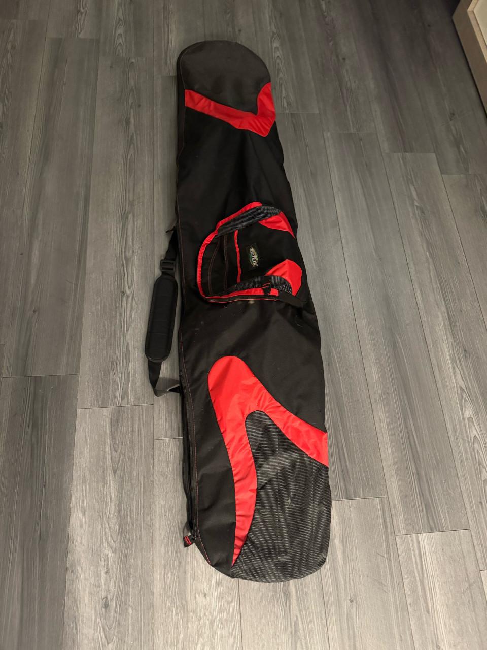 Atomic snowboard met bindingen en tas