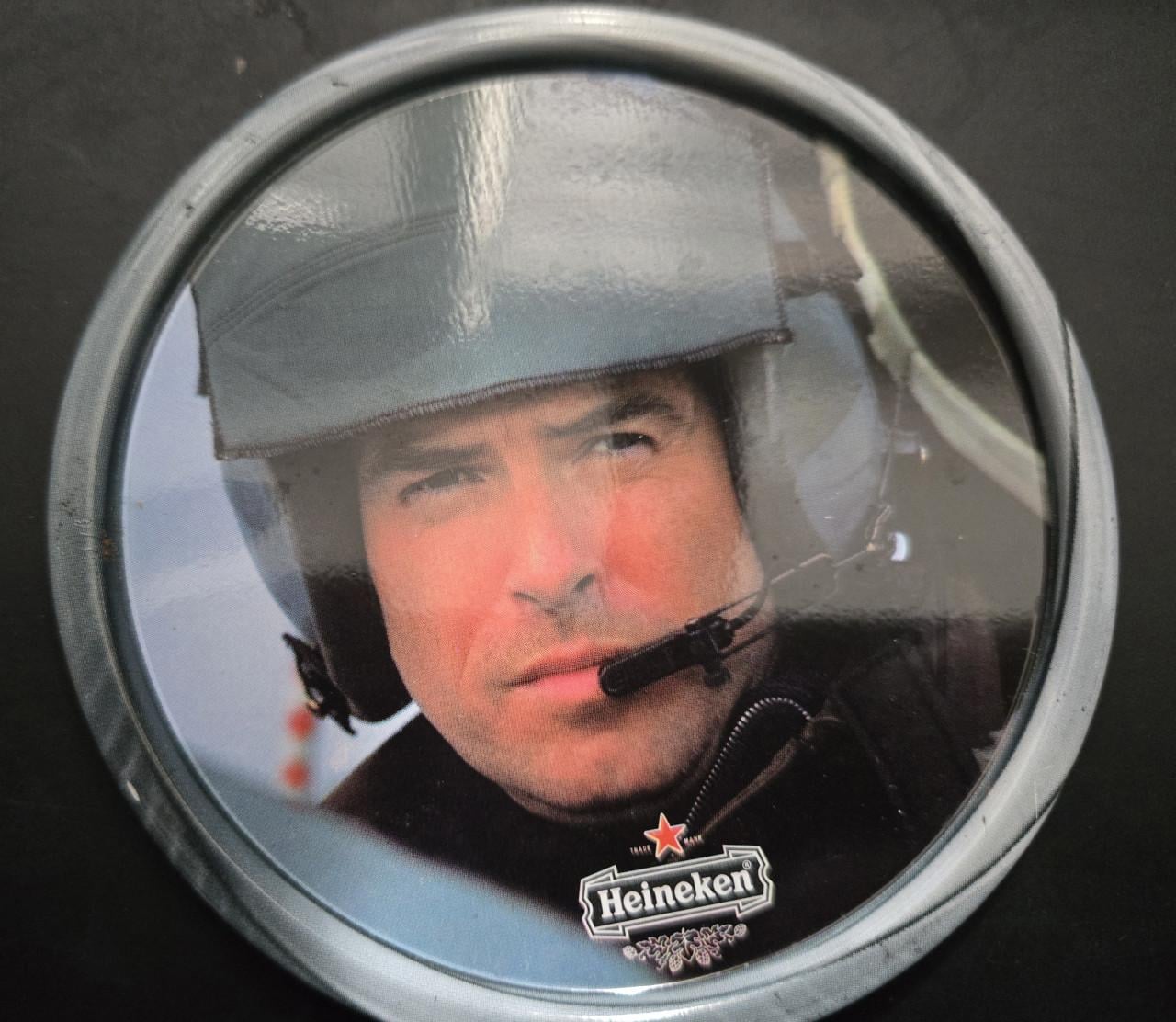 Blik met 9 bierviltjes van Heineken James Bond "Tomorrow Never Dies