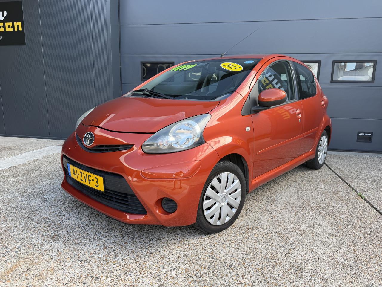 Toyota Aygo 1.0 12V Vvt-i 5DRS 2013 Dynamic Orange Airco Apk