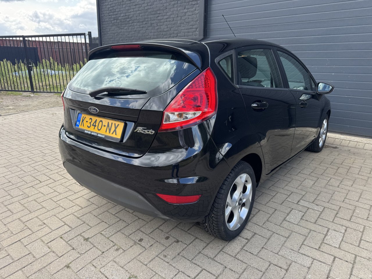 Ford Fiesta 1.25 44KW Ghia 5DRS 2010 Zwart Airco Apk Nap