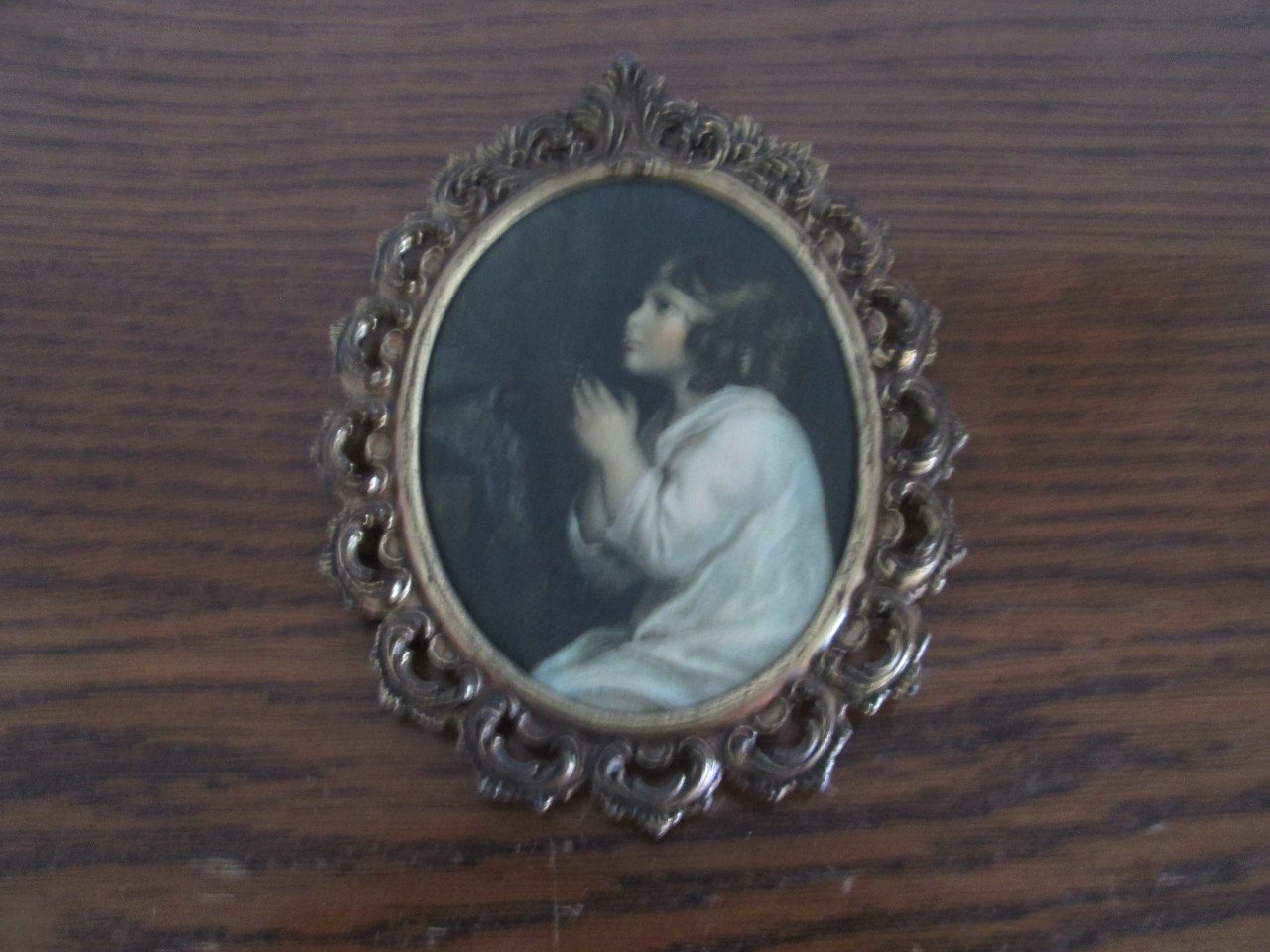 Lijstje met biddend meisje