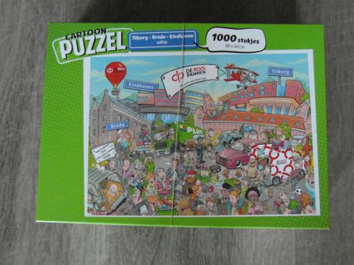 Cartoon puzzel 1000 stukjes. Tilburg-Breda-Eindhoven.