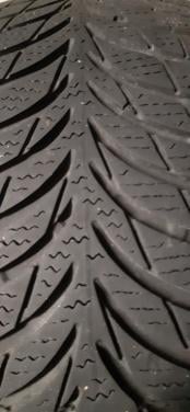 4 winterbanden op velg + wieldoppen (205/65/15)