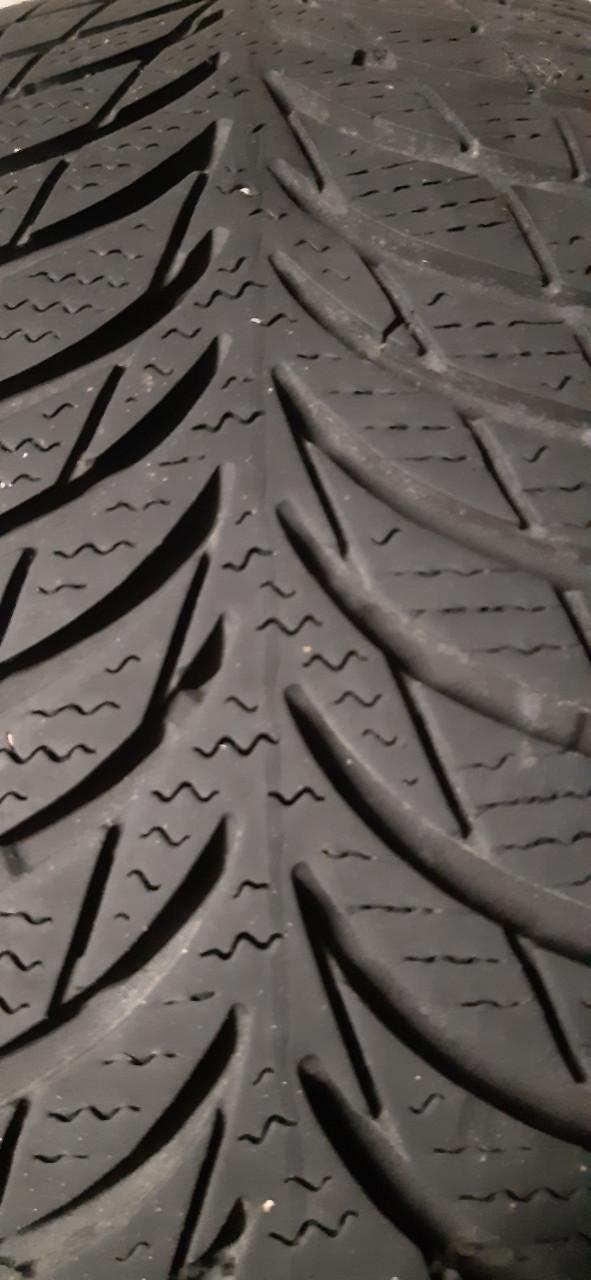 4 winterbanden op velg + wieldoppen (205/65/15)