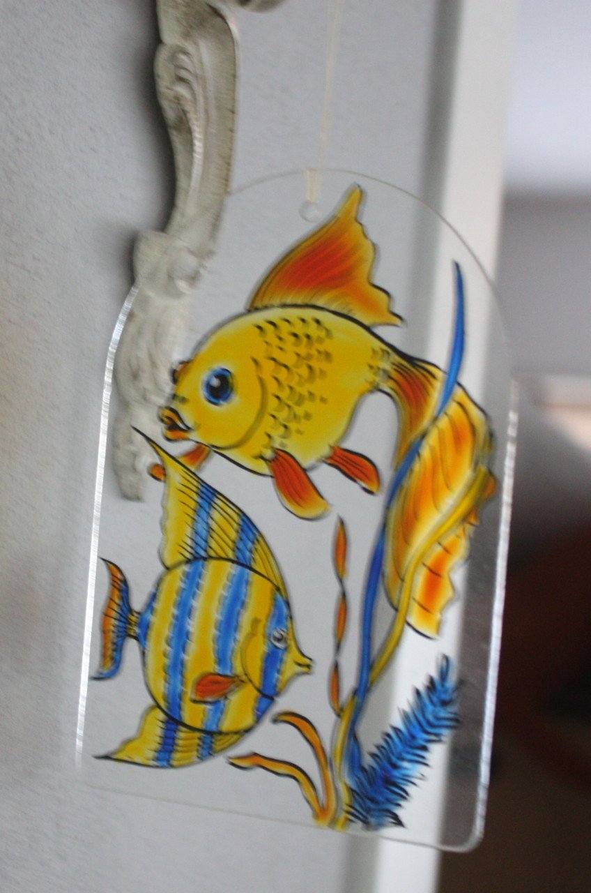 Geschilderd glas met vissen
