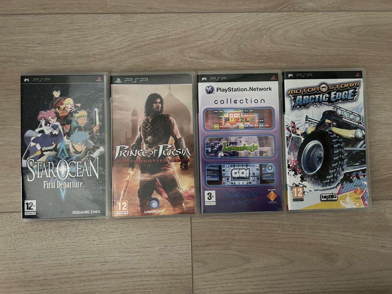 PSP 2000 met case en spellen