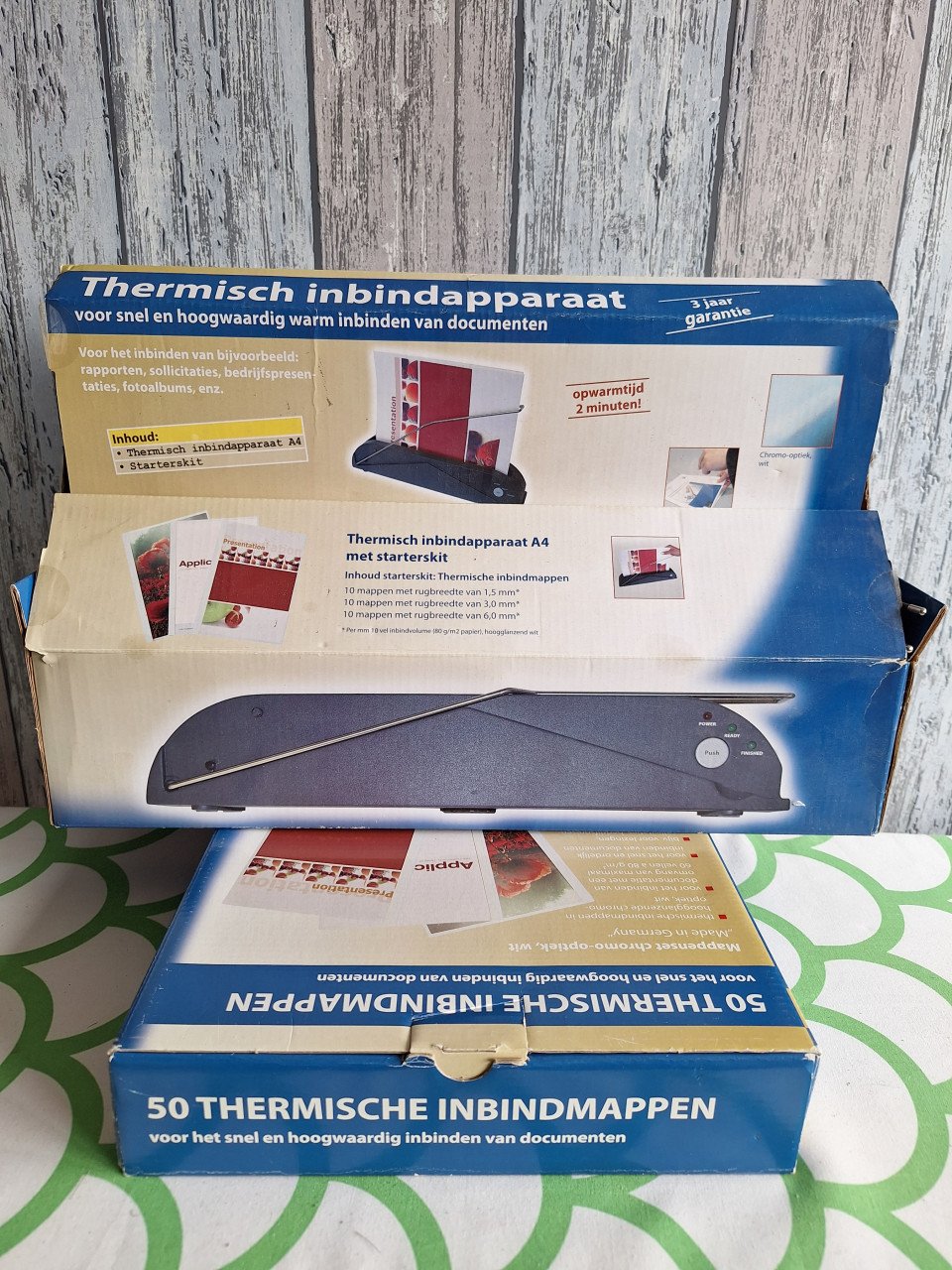 Inbindapparaat met inbindmappen
