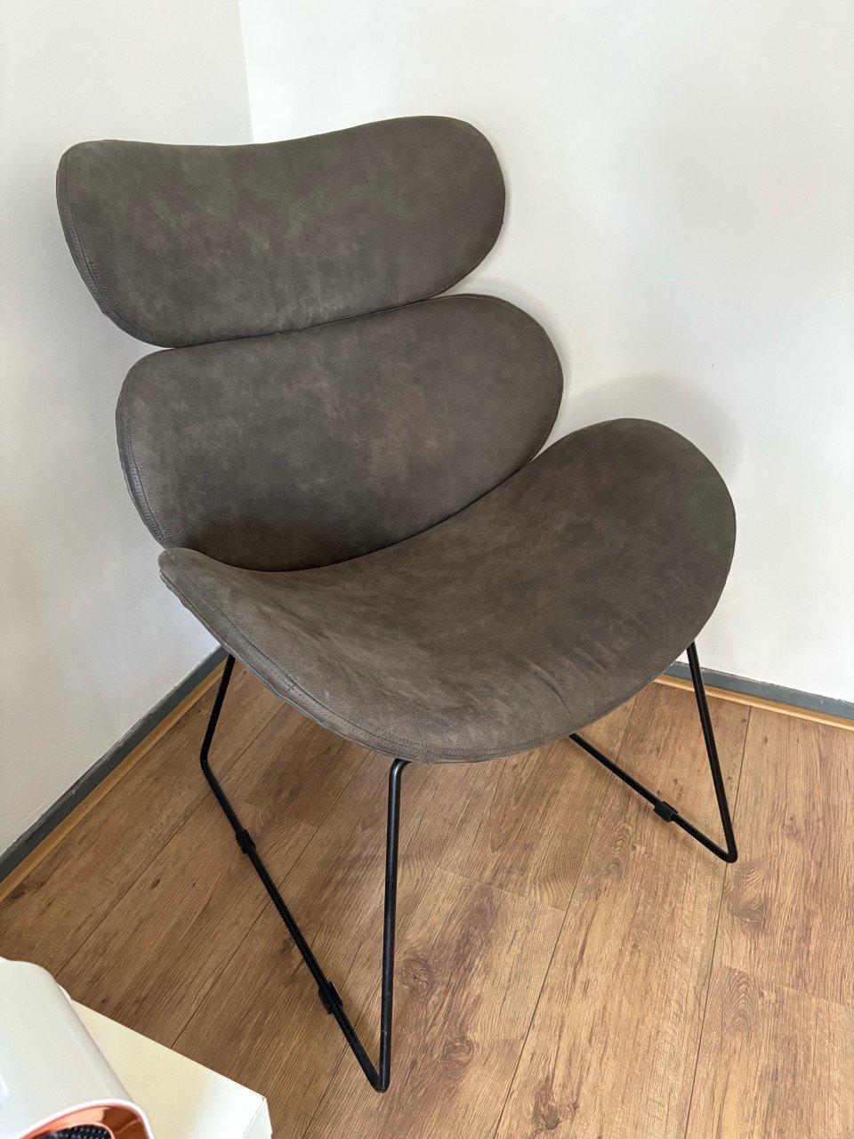 Grijze fauteuil