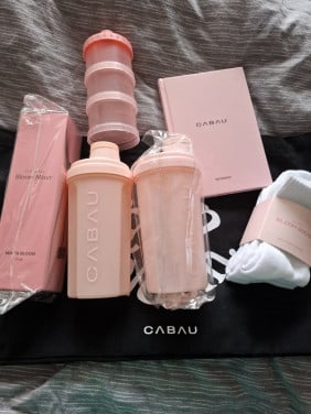 Cabau: mixer, sokken, shaker, notebook, poedertoren, tas XL