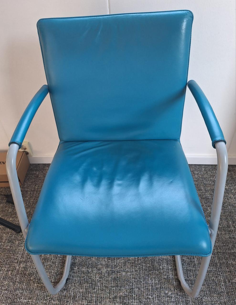 4 blauwe eetkamerstoelen Leo Lux leer